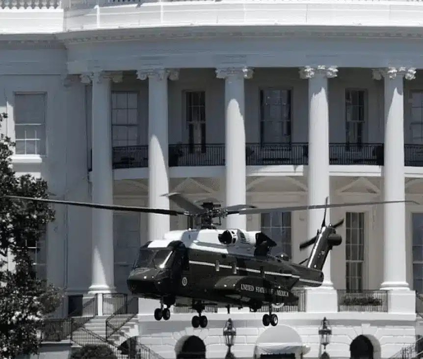 Air Force One helicopter taking off in front of The White House