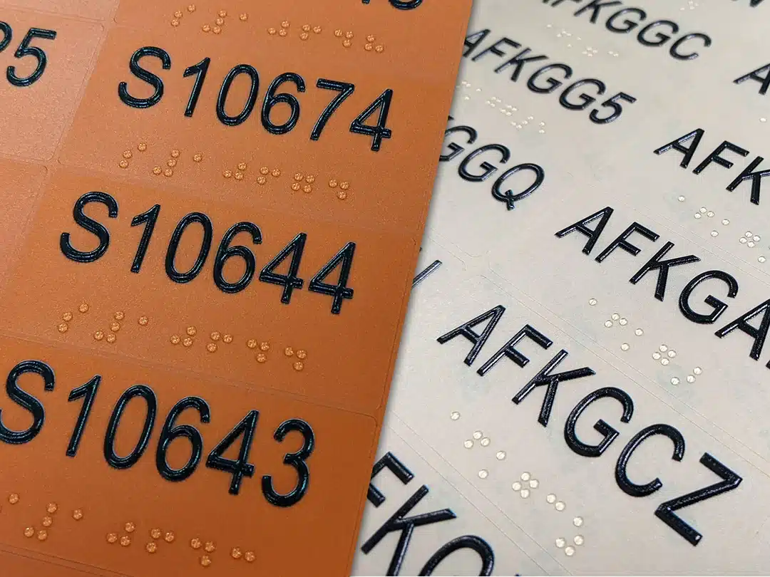 braille decal labels close up from above 