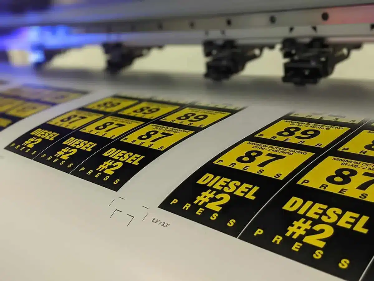 gas pump decals being printed on an oversized inkjet printer